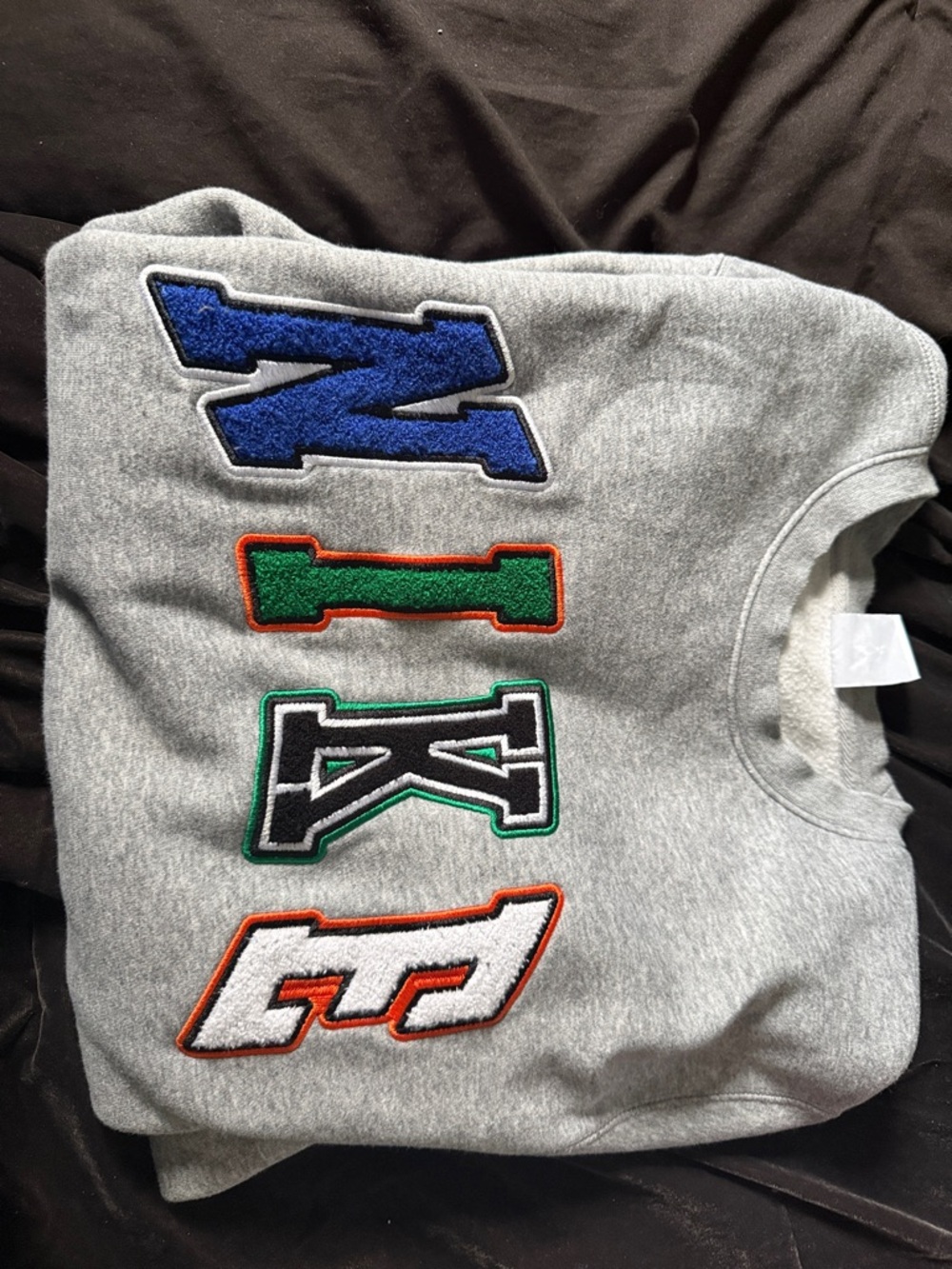 Nike Gray Sweatshirt with Blue, Green, Black and White Letter Patches